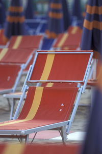 Close-up of empty chairs and table in restaurant