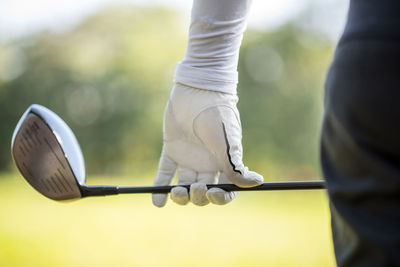 Cropped image of golfer