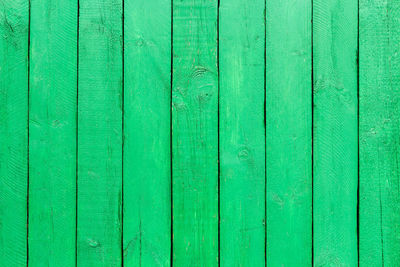 Full frame shot of green wooden table