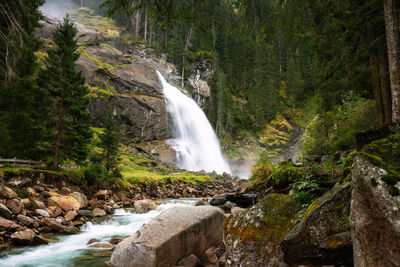 Scenic view of waterfall in forest