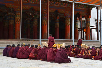 Group of monks outside temple