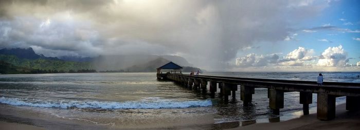Panoramic view of pier on sea against sky