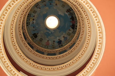 Low angle view of illuminated ceiling