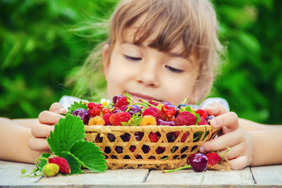 Close-up of cute girl eating food