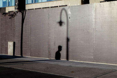 Shadow of man on building