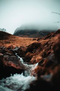 Scenic view of land against sky