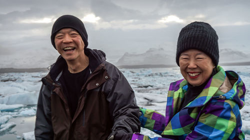 Portrait of smiling woman in snow