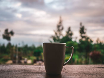 Close-up of coffee cup on table
