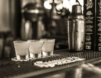 Close-up of glasses on table