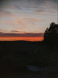 Scenic view of silhouette landscape against sky during sunset