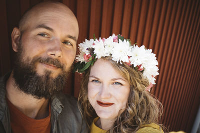 Portrait of smiling couple looking at camera