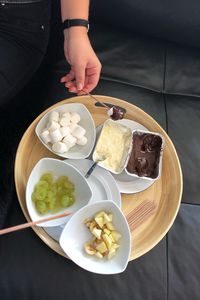 High angle view of person preparing food on table