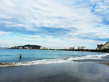 View of sea against cloudy sky