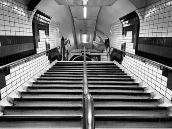 Low angle view of illuminated subway station