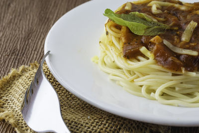 Close-up of noodles in plate on table