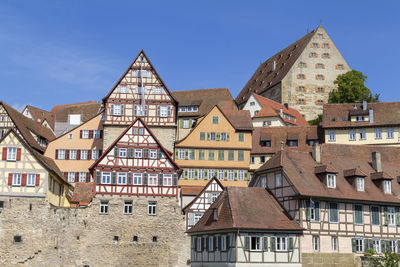 Buildings in city against sky