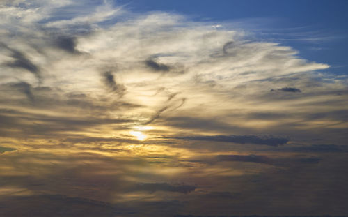 Low angle view of clouds in sky during sunset