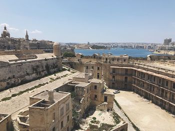 High angle view of buildings against clear sky