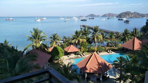 Panoramic view of sea and buildings against sky