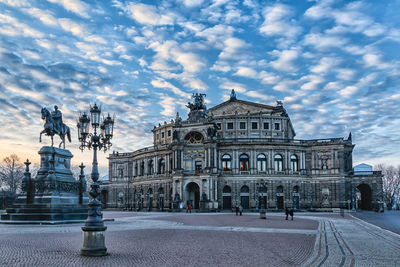 Building against cloudy sky