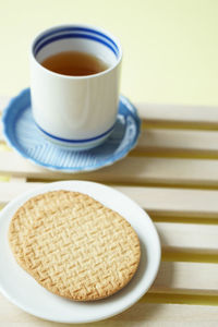 Close-up of coffee cup on table