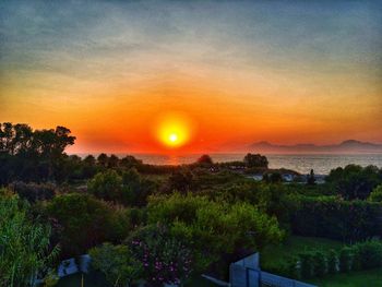 Scenic view of landscape against sky during sunset