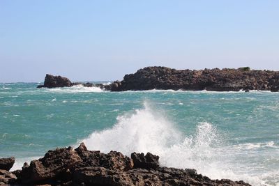 Scenic view of sea against clear sky