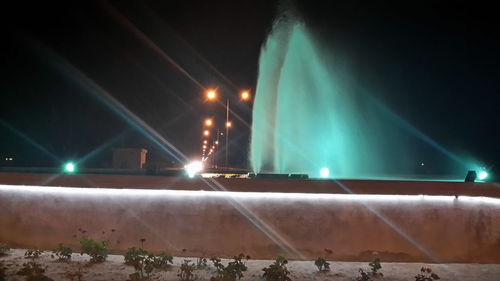 Illuminated street light at night