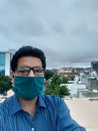 Wearing mask on office roof