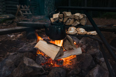 High angle view of fire on campfire ring