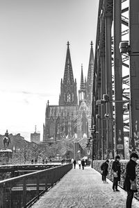 Diminishing perspective of cologne cathedral against clear sky