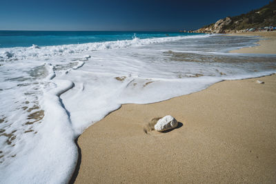 Scenic view of beach against sky