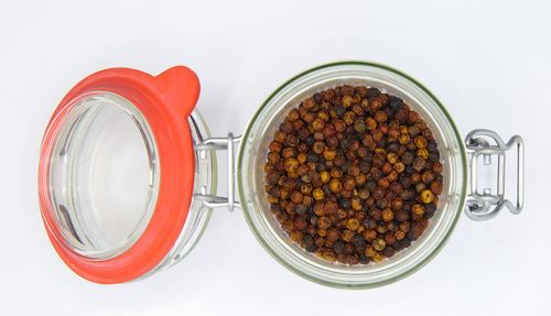 Directly above shot of food on table against white background