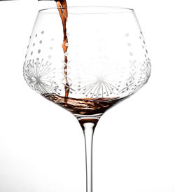 Close-up of beer glass against white background