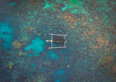 Aerial view of boat in sea