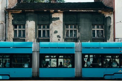 Train against abandoned building