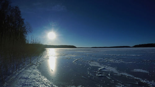 Sun shining over landscape