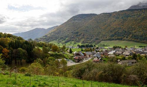 Scenic view of landscape and mountains against sky