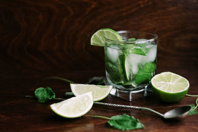 Close-up of juice with drink on table
