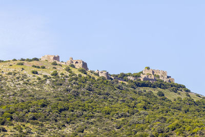 Low angle view of fort against clear sky