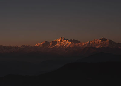 Sun setting over mount kedarnath in uttarakhand, india