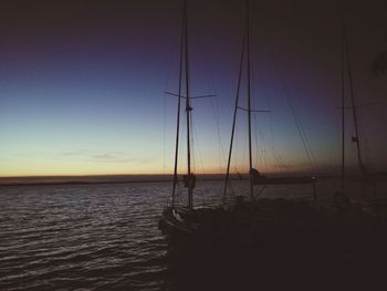 Scenic view of sea against clear sky during sunset