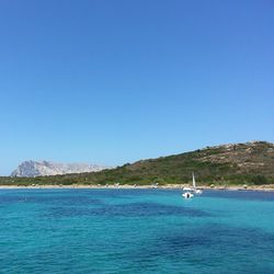 Boat sailing in sea