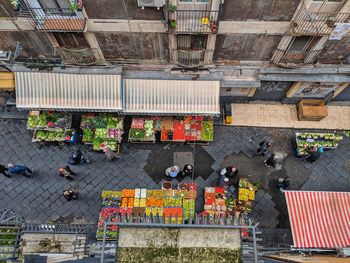 High angle view of people working on street in city