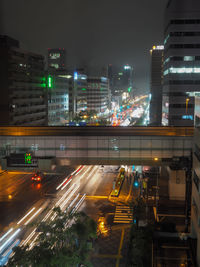 High angle view of light trails on city street at night