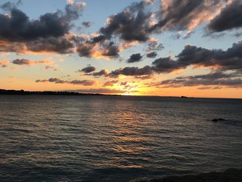 Scenic view of sea against sky during sunset