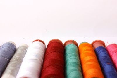 Close-up of multi colored pencils on white background