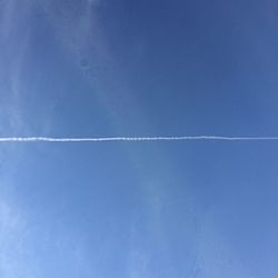 Vapor trail in blue sky
