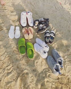 High angle view of shoes on sand