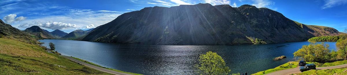 Panoramic view of lake and mountains against sky